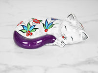ceramic sleeping cat purple