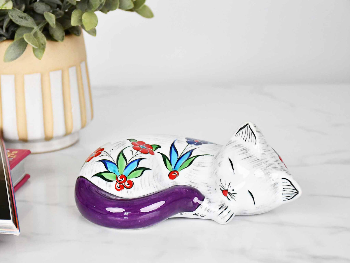 ceramic sleeping cat purple
