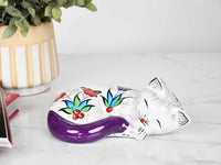ceramic sleeping cat purple