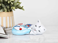 ceramic sleeping cat light blue