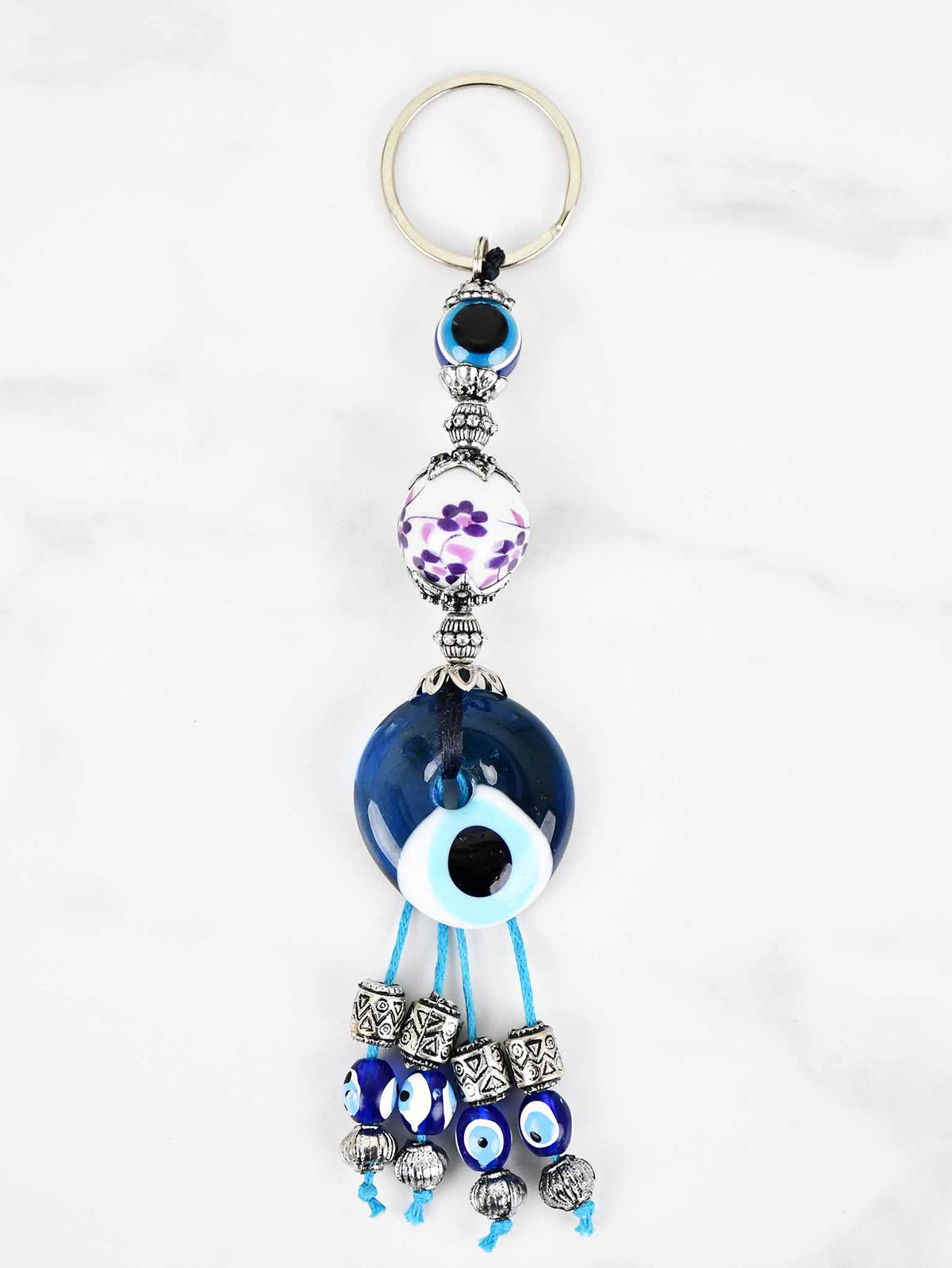evil eye purple ceramic ball keychain